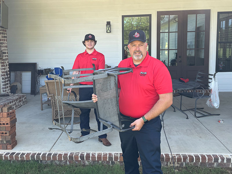 Junk Busters Experts Carrying Furniture